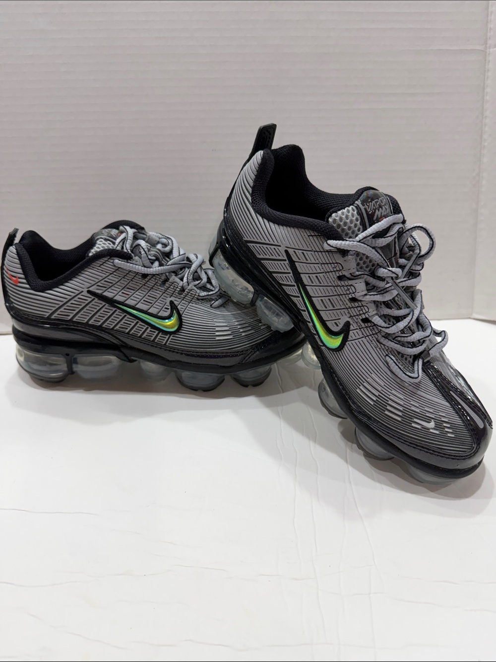 Nike Gray and Black Women's Sneakers with Green Accent Swoosh
